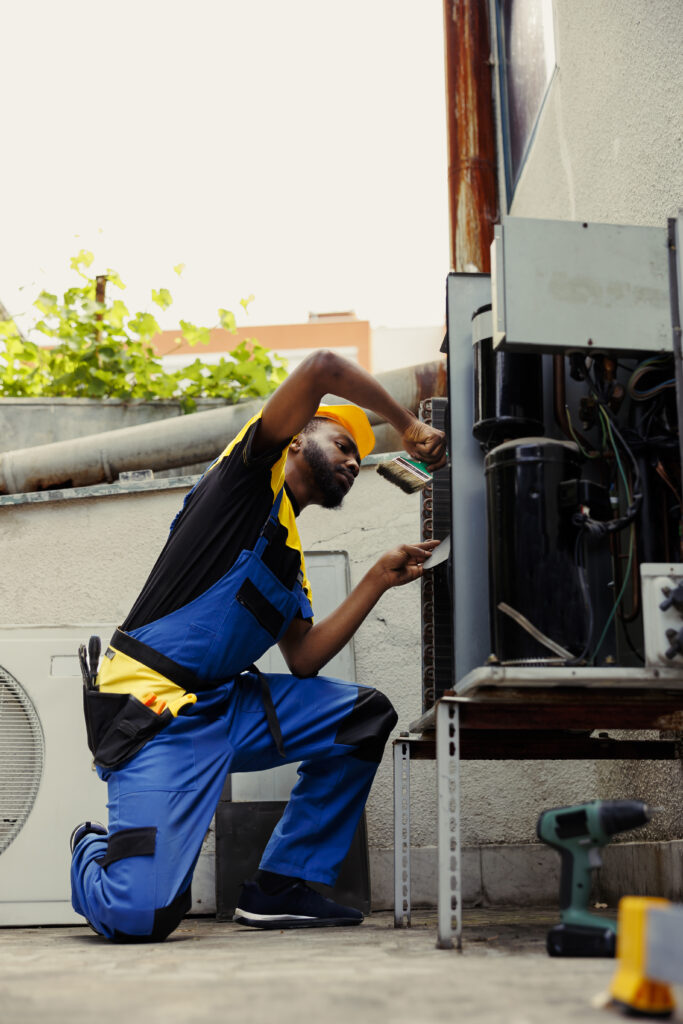 serviceman hired for condenser checkup